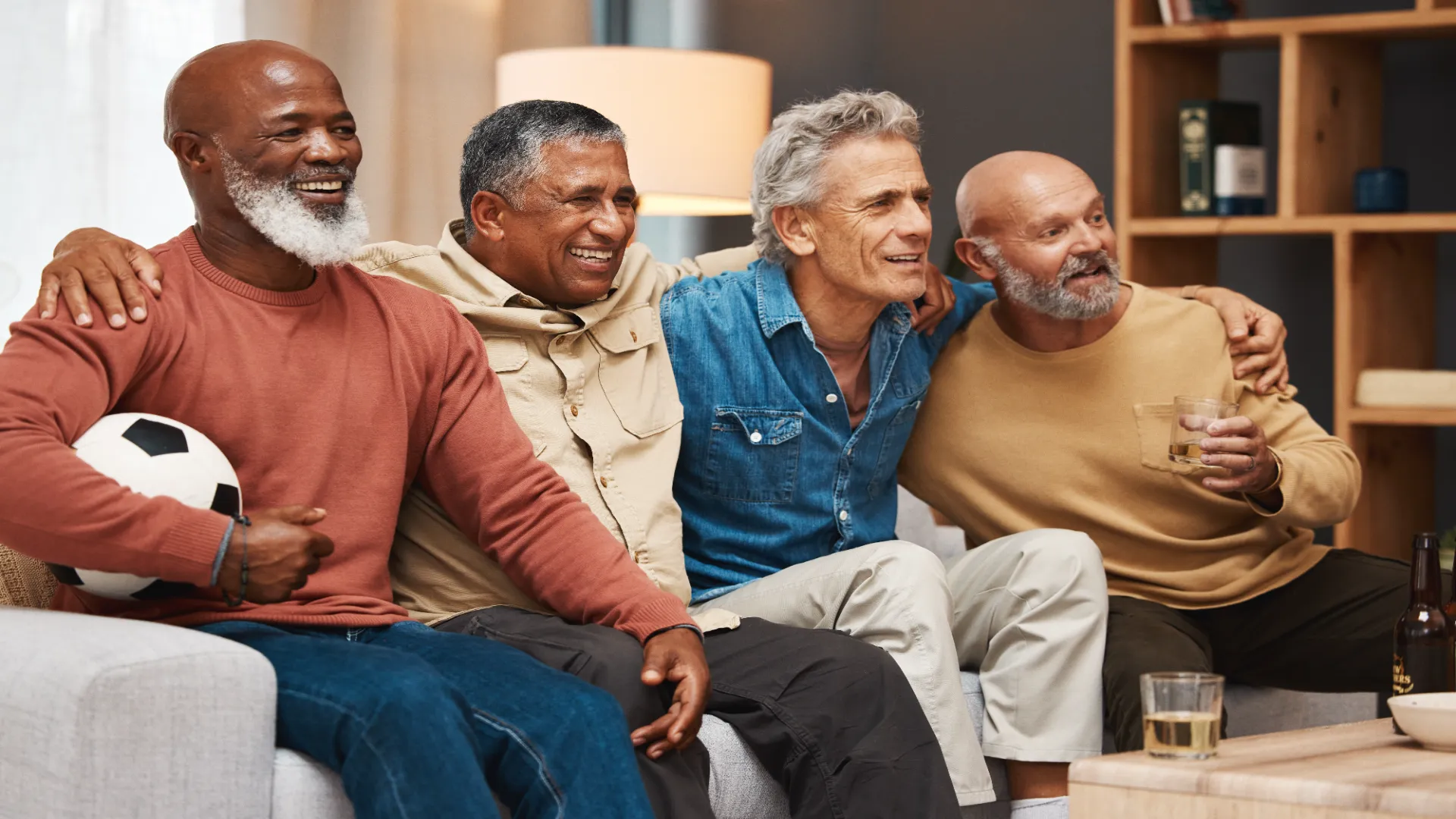 senior-friends-and-watching-football-on-tv-relax-2023-11-27-05-18-18-utc